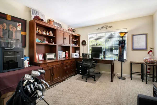 a view of a living room and bathroom