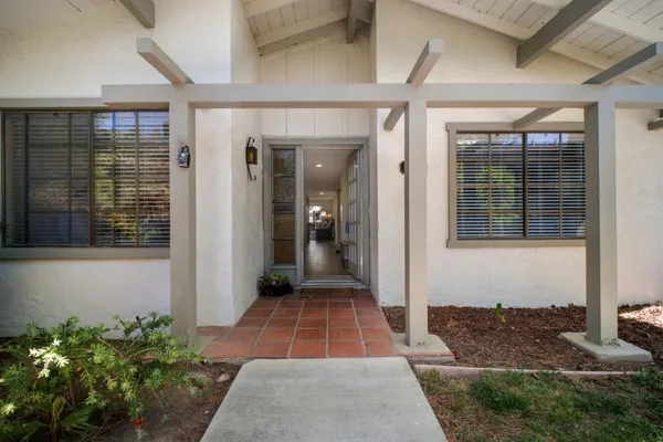 a house view with a outdoor space