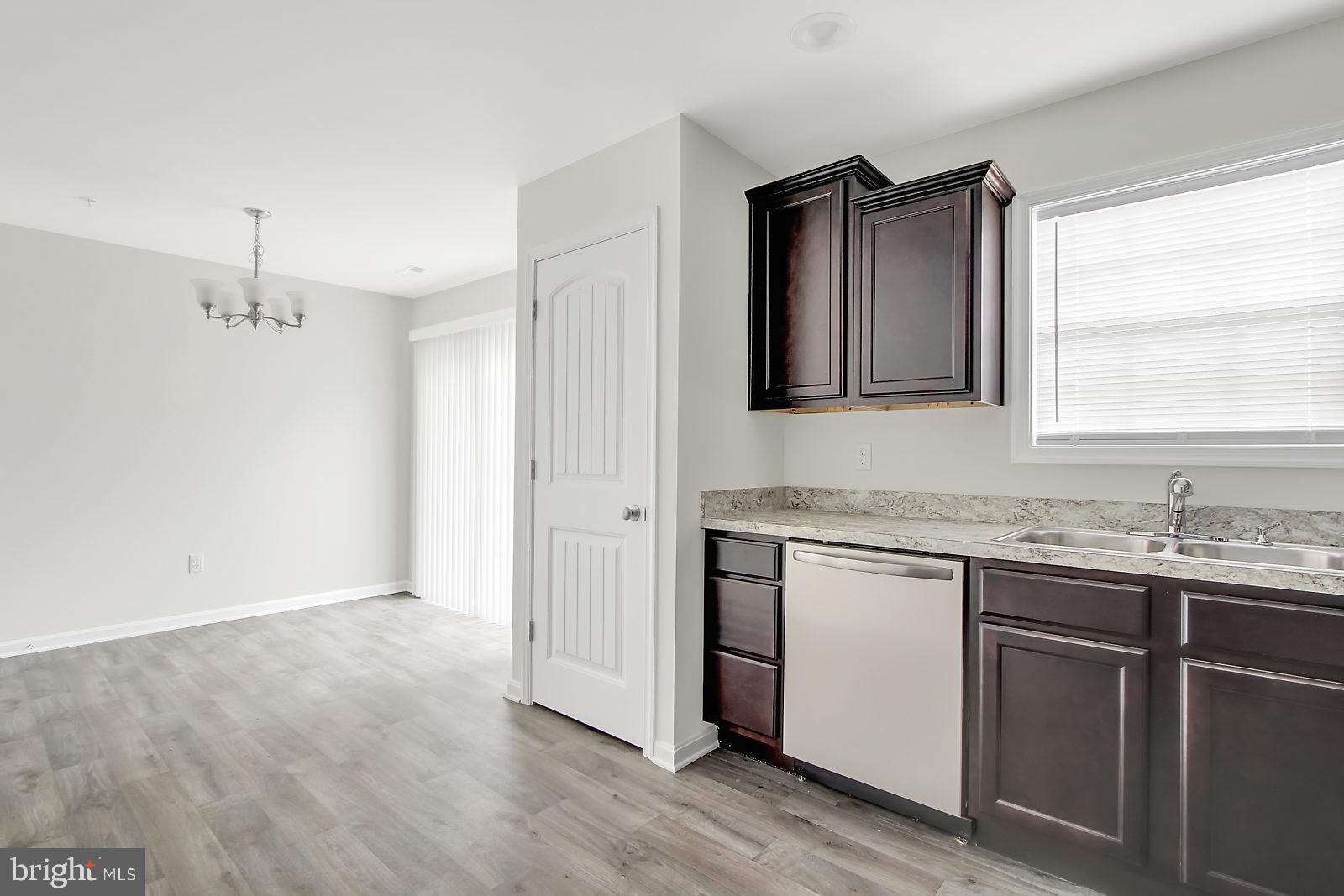 127 Balsam Lane Hanover, PA 17331 - Photo 3 of 11 a bathroom with a granite countertop sink and a mirror