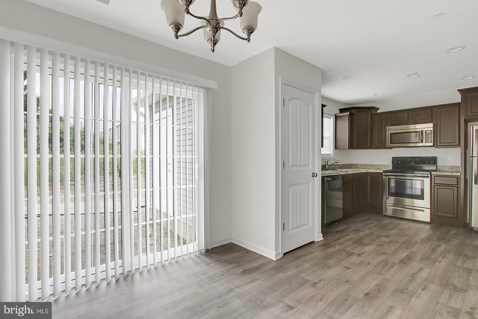 127 Balsam Lane Hanover, PA 17331 - Photo 6 of 11 a kitchen with a refrigerator and a sink