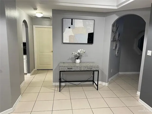 a bathroom with a sink a mirror and a shower