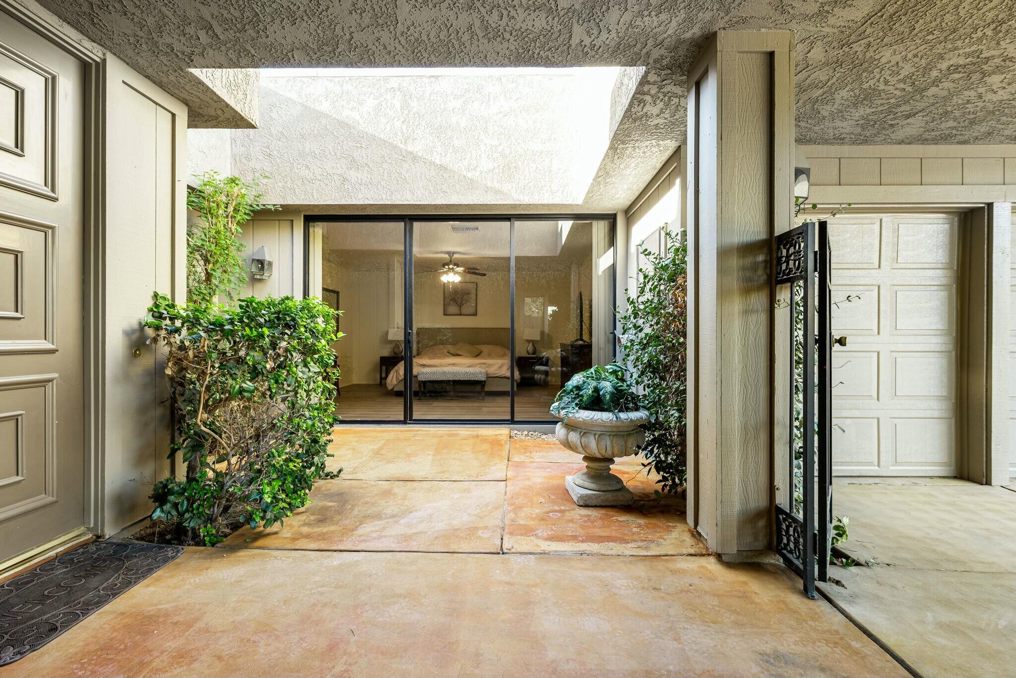 6 Stanford Drive Rancho Mirage, CA 92270 - Photo 26 of 39 a view of a entryway door front of house