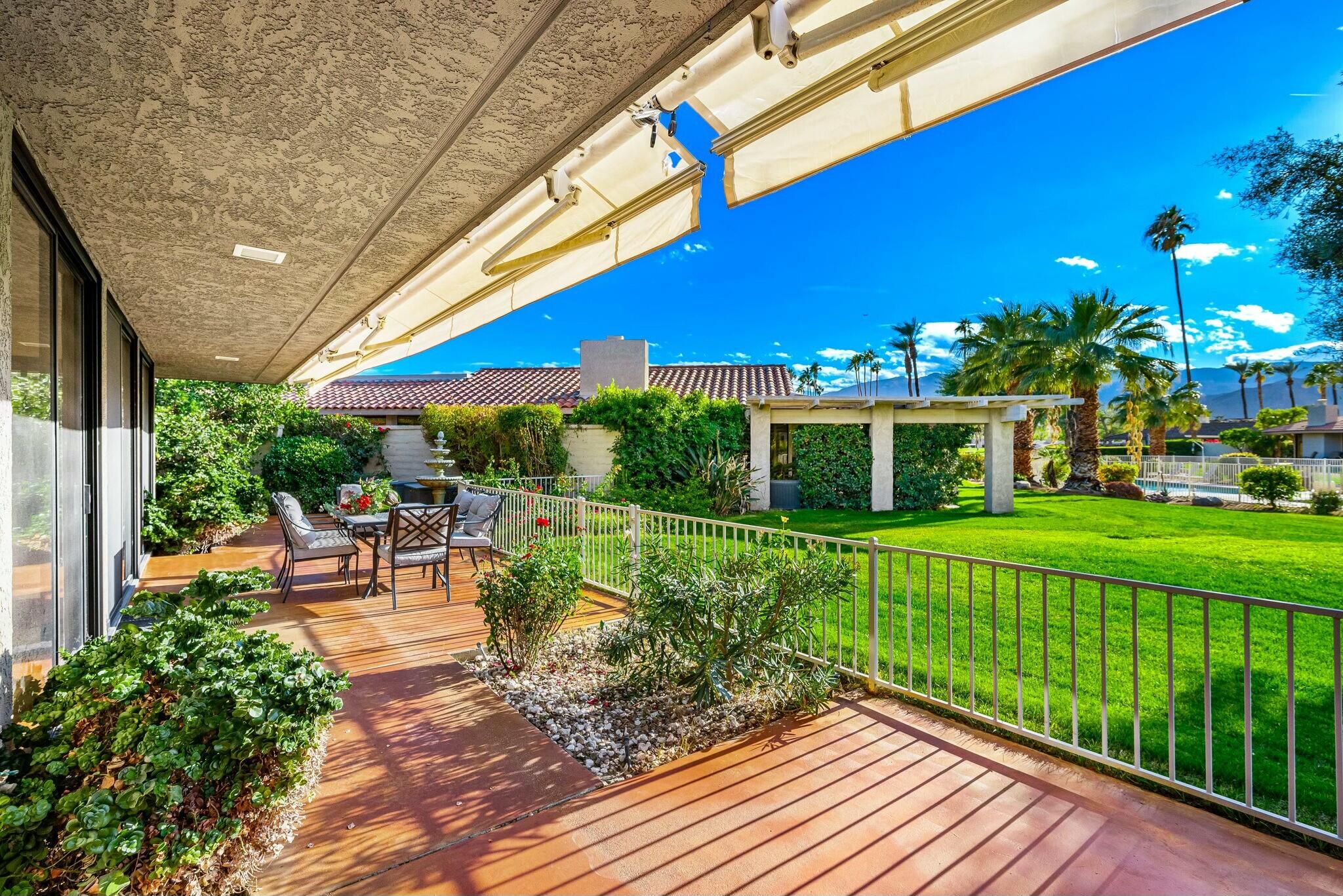6 Stanford Drive Rancho Mirage, CA 92270 - Photo 31 of 39 a view of a house with a yard