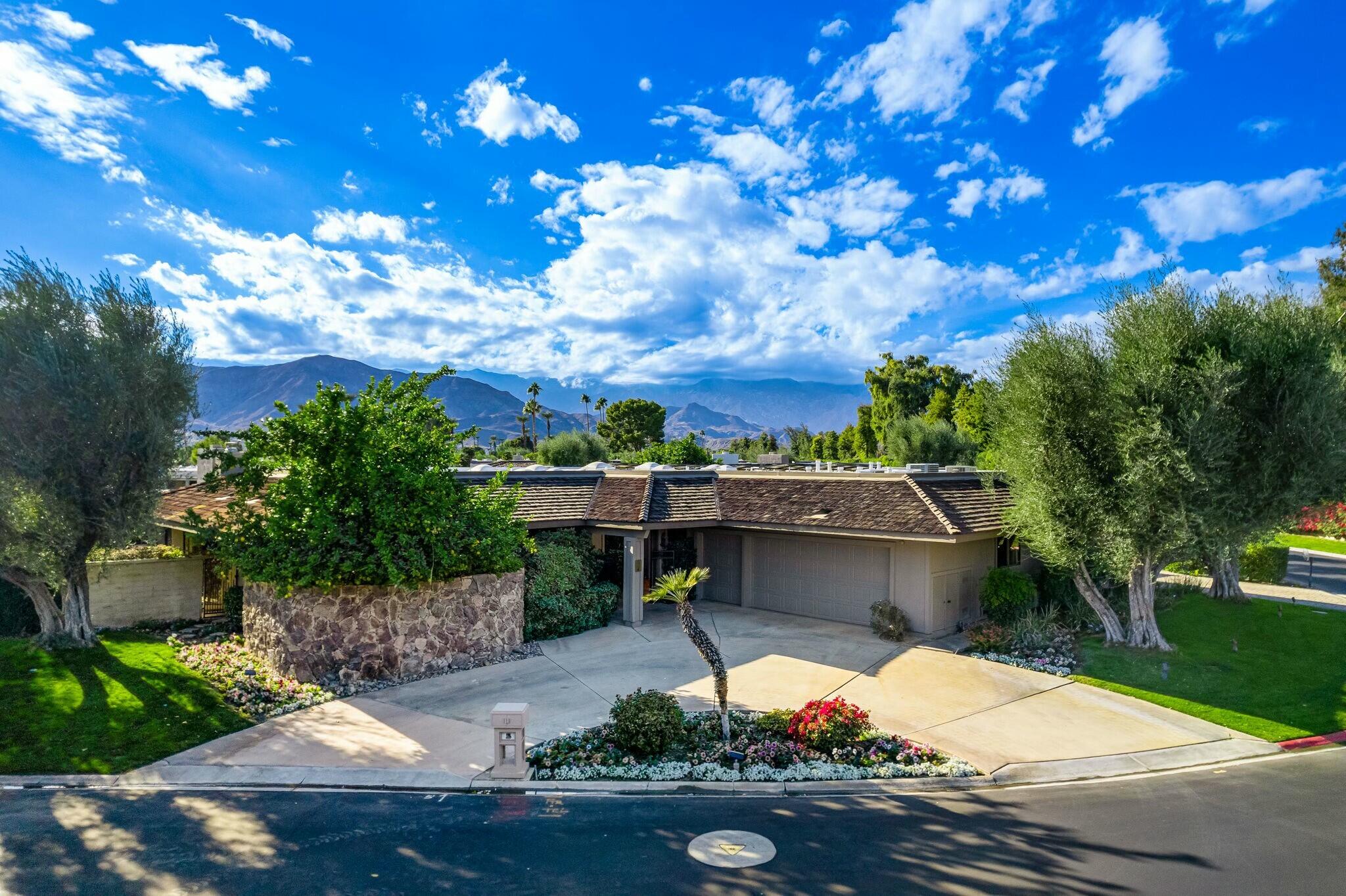 6 Stanford Drive Rancho Mirage, CA 92270 - Photo 39 of 39 a view of a swimming pool with a patio