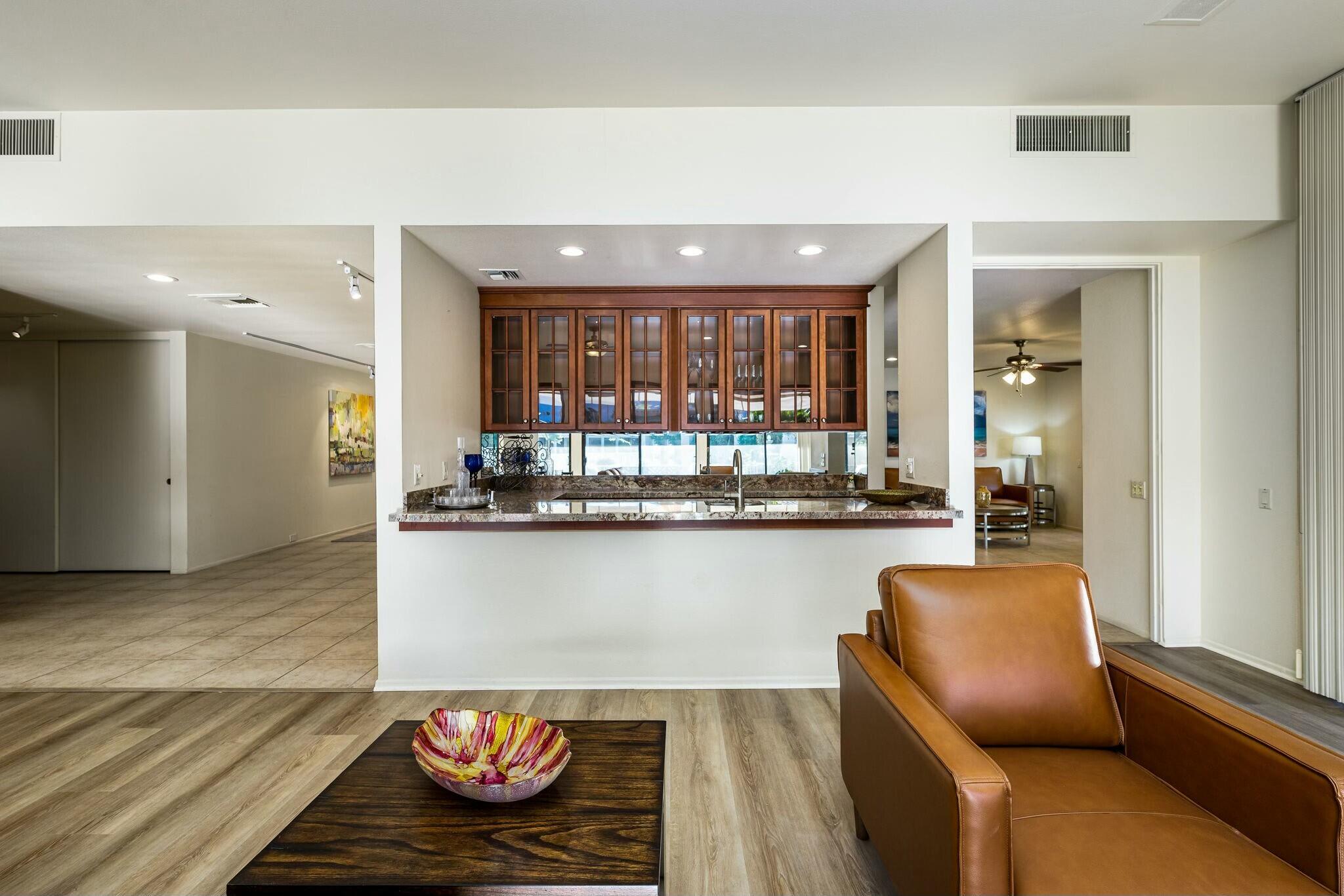 6 Stanford Drive Rancho Mirage, CA 92270 - Photo 10 of 39 a kitchen with stainless steel appliances granite countertop a refrigerator and a stove top oven