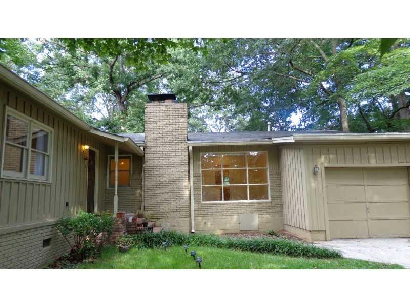 Exterior Front. RUSTIC RANCH, BRICK AND FRAME, TOP ATLANTA LOCATION, LONG PRIVATE DRIVEWAY, IF YOU DO NOT WANT COOKIE CUTTER, LIKE PRIVACY IN A PRIME LOCATION, COME AND TAKE A LOOK AT THIS GREAT STARTER HOME, RENOVATIE,OR TEAR IT DOWN.  THIS HOME HAS A WONDERFUL INTOWN A