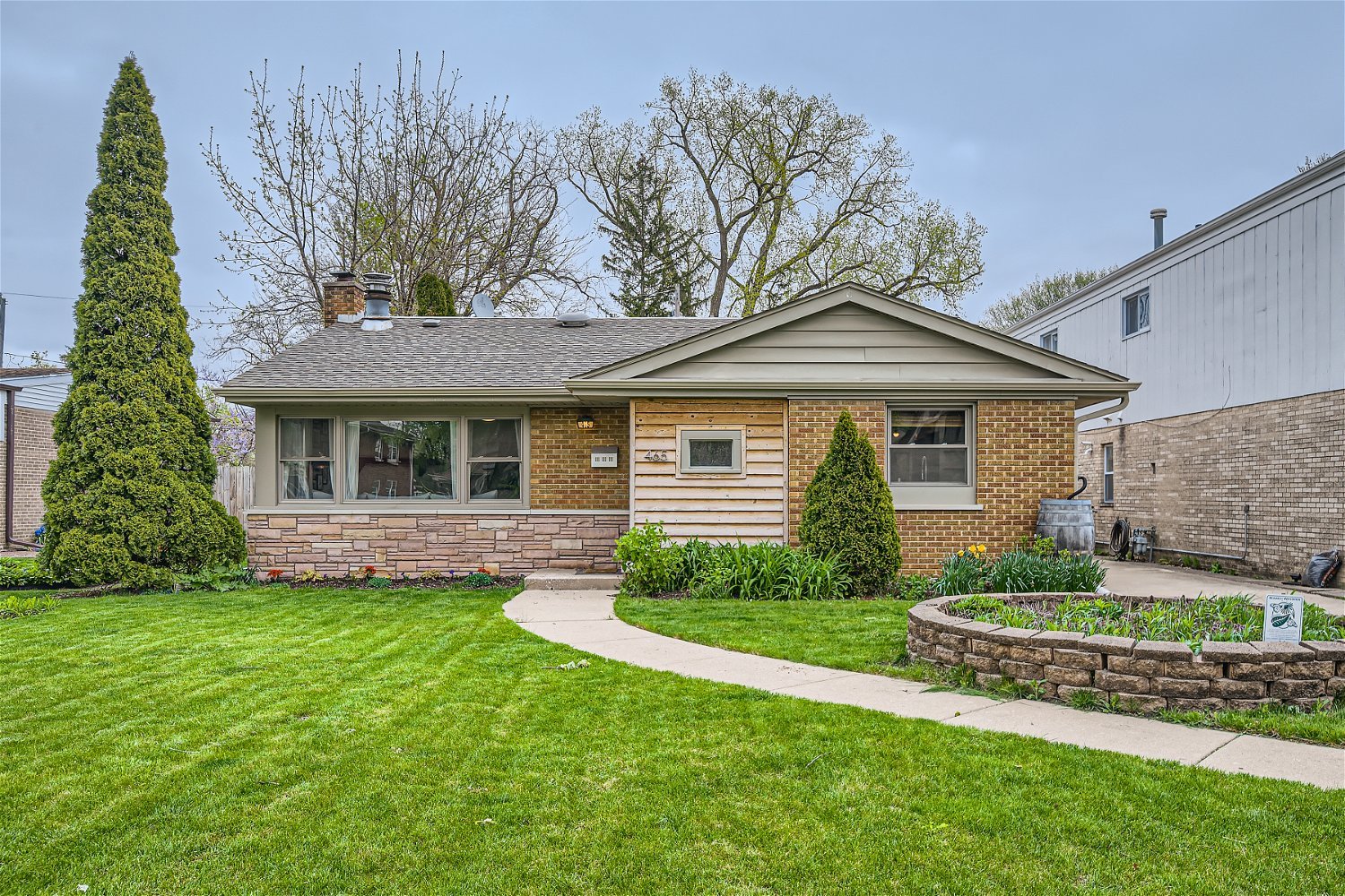 465 Northgate Court Riverside, IL 60546 - Photo 1 of 27 a front view of a house with a yard