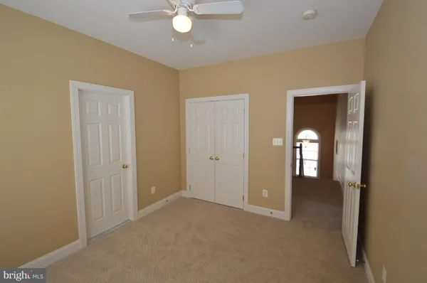a view of a room with closet area