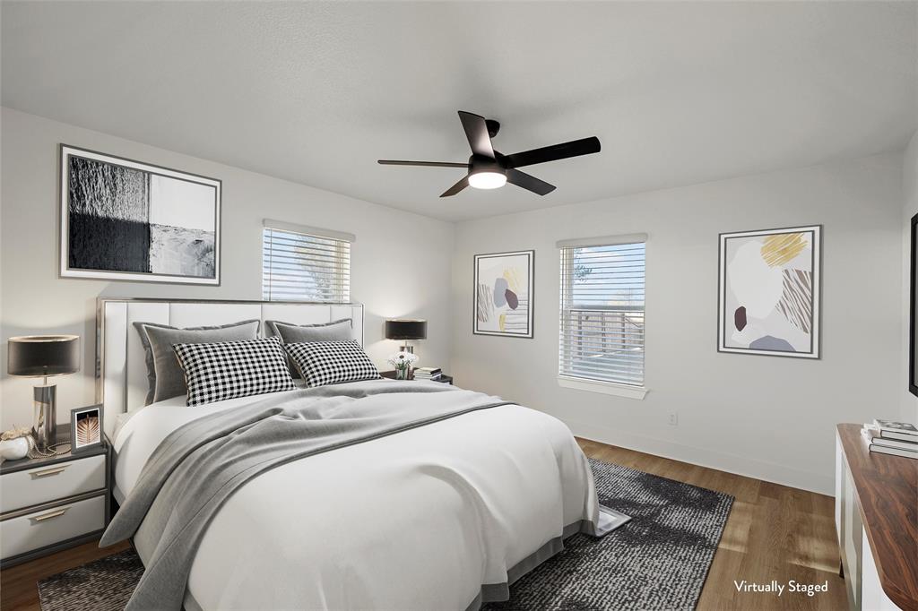 175 4 Corners Road West, TX 76691 - Photo 17 of 30 a bedroom with a large bed and a window