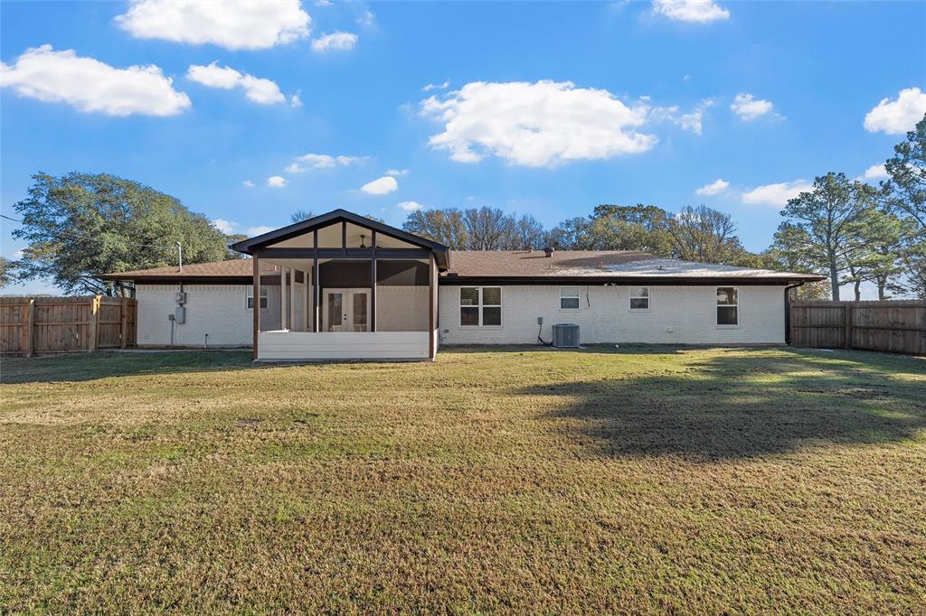 175 4 Corners Road West, TX 76691 - Photo 25 of 30 a front view of a house with a yard
