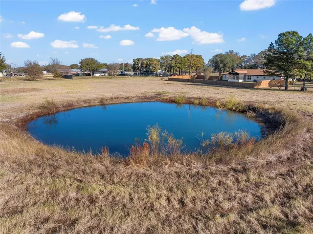 a view of a lake with outdoor space