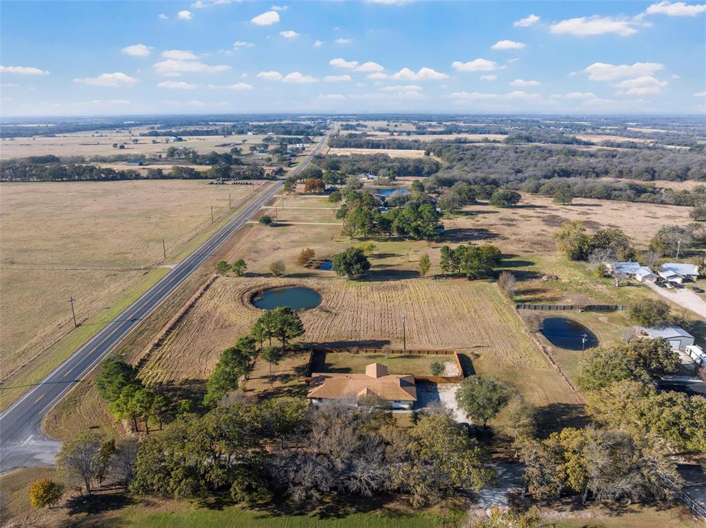 175 4 Corners Road West, TX 76691 - Photo 29 of 30 an aerial view of residential building and lake