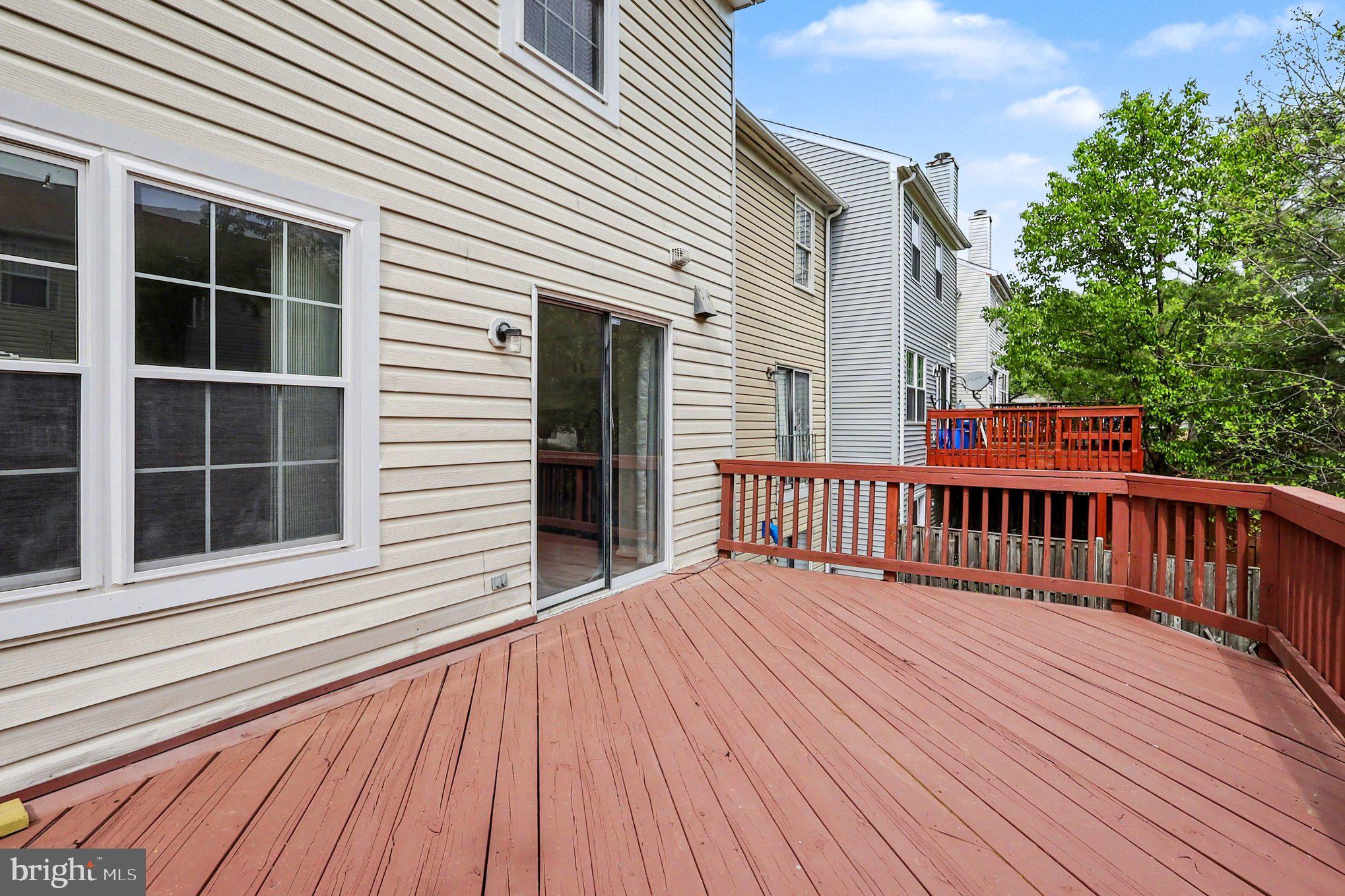 14721 McKnew Road Burtonsville, MD 20866 - Photo 24 of 30 a view of a wooden deck