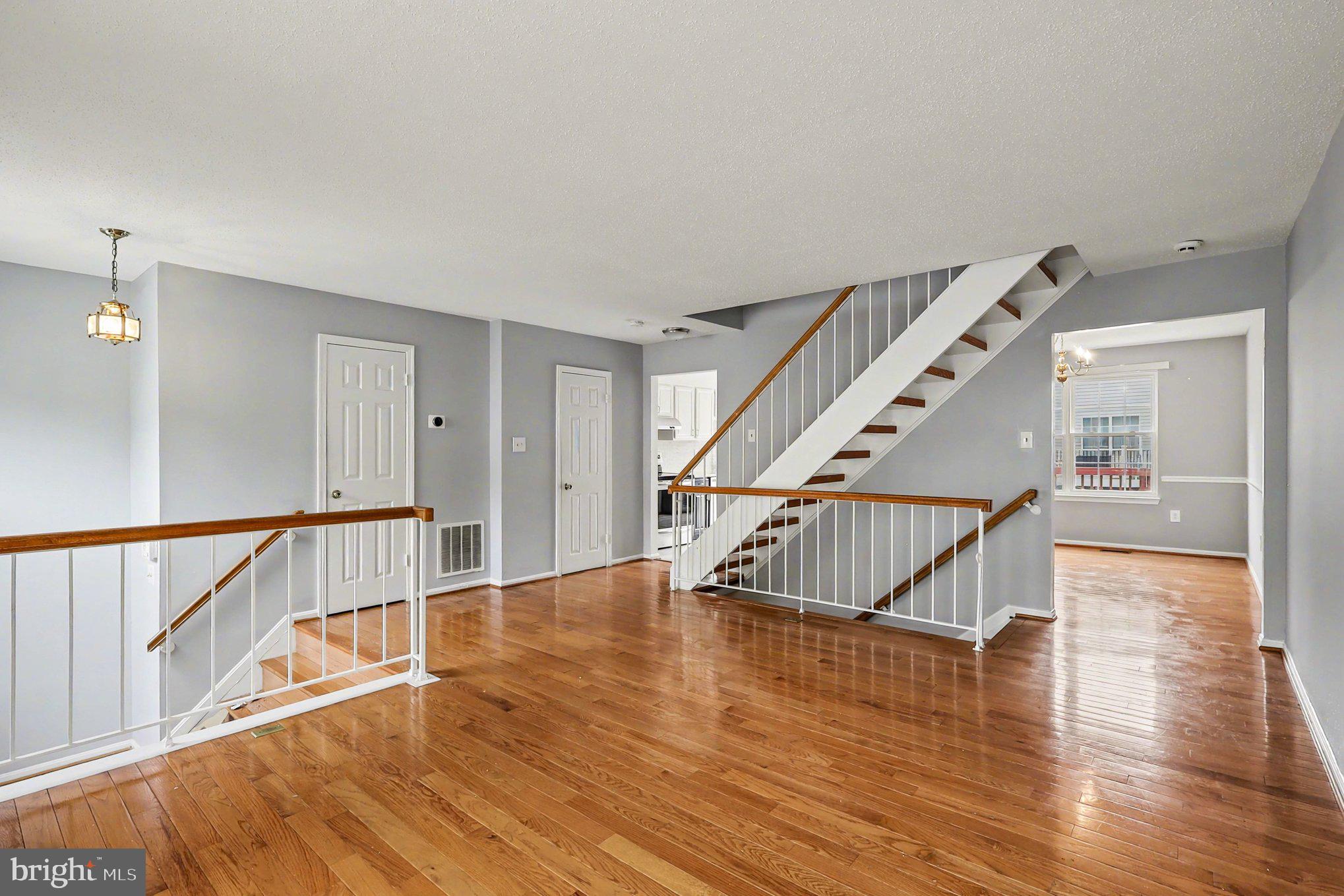 14721 McKnew Road Burtonsville, MD 20866 - Photo 5 of 30 a view of entryway with wooden floor