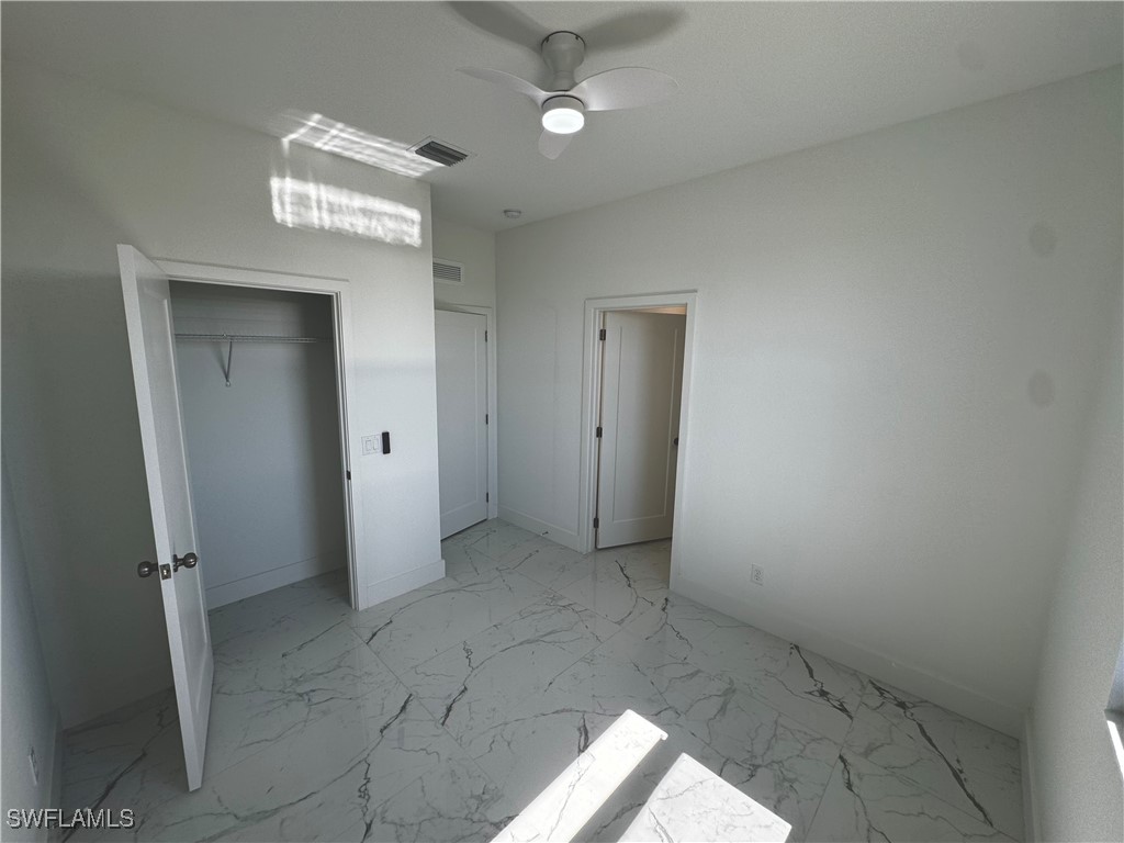 7016 Tide Circle LaBelle, FL 33935 - Photo 21 of 47 an empty room with a bathroom