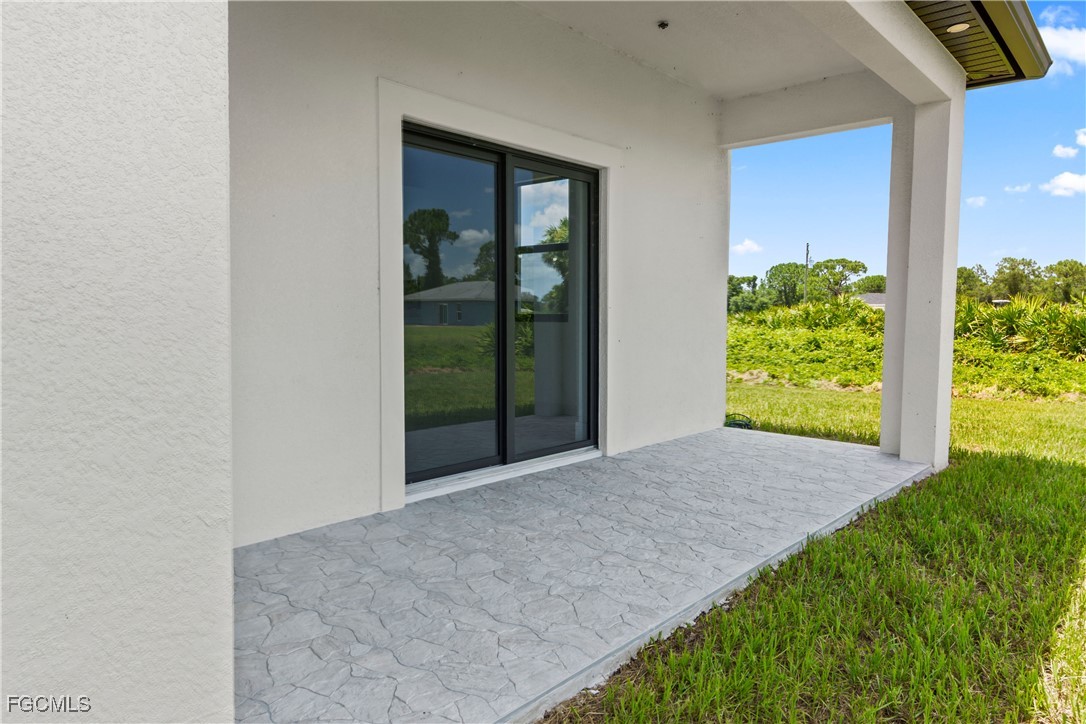7016 Tide Circle LaBelle, FL 33935 - Photo 43 of 47 a view of a backyard of the house