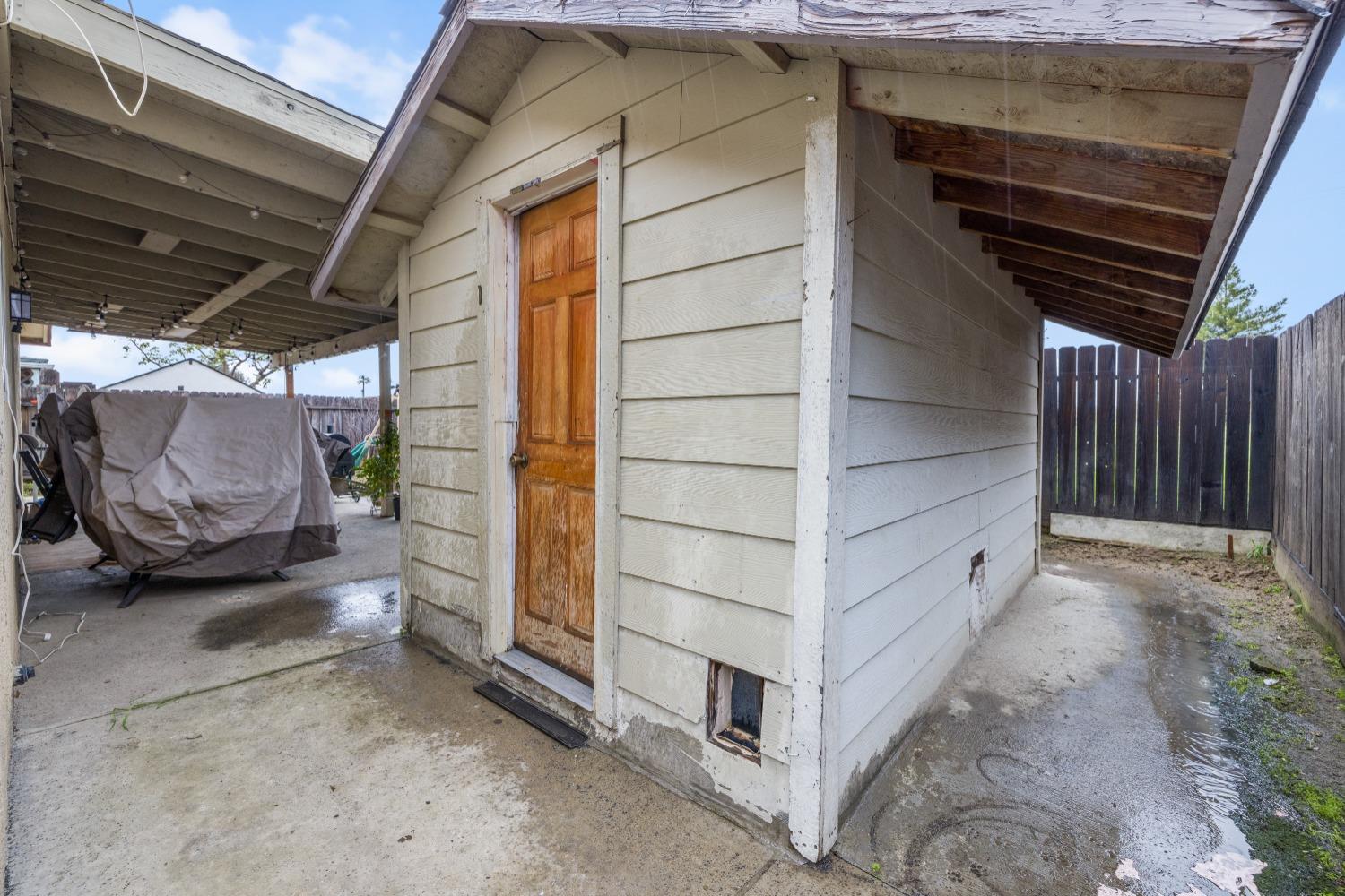 13590 9th Street Parlier, CA 93648 - Photo 30 of 30 a view of an empty room with a brick wall
