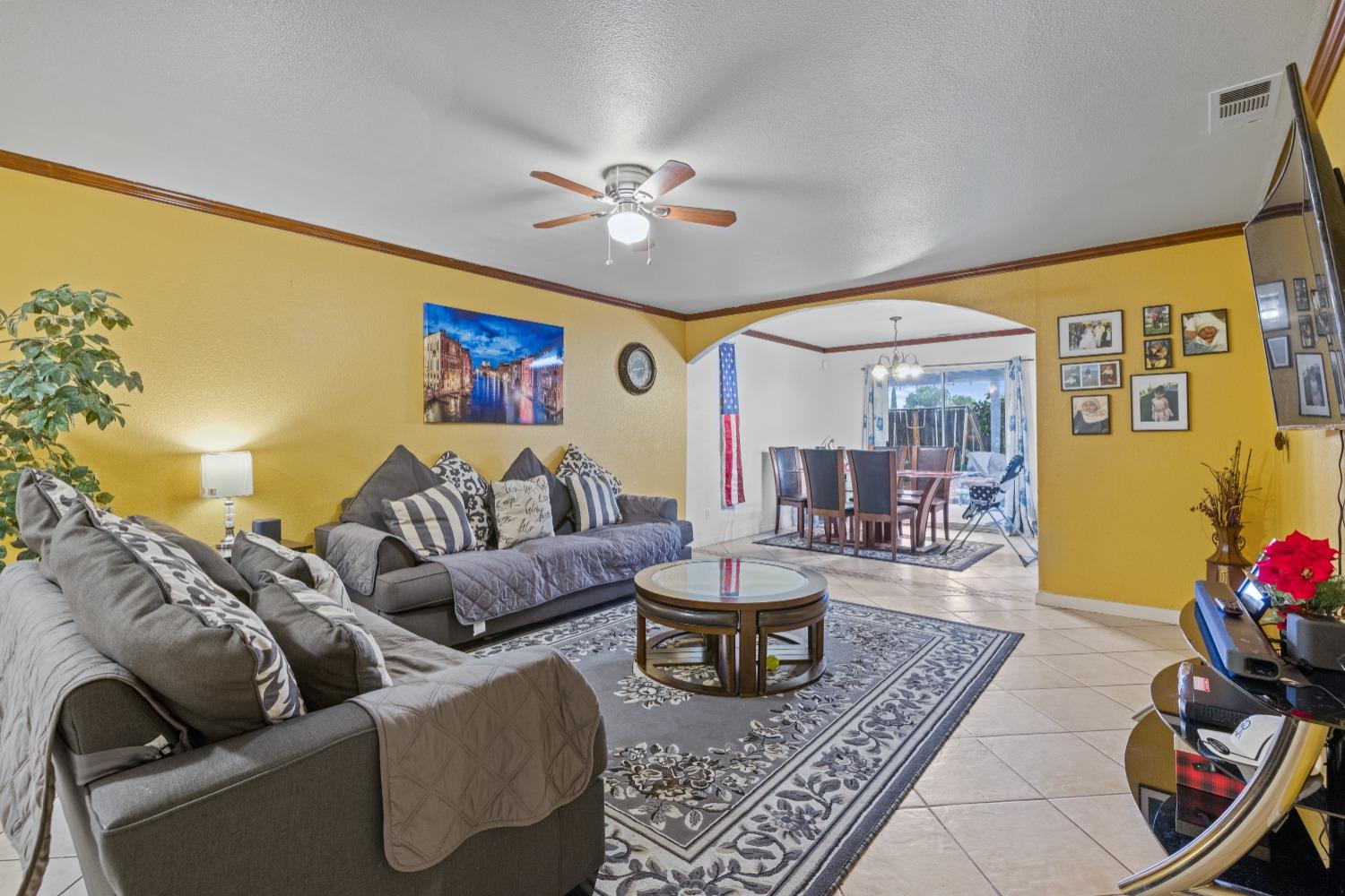13590 9th Street Parlier, CA 93648 - Photo 6 of 30 a living room with furniture and wooden floor