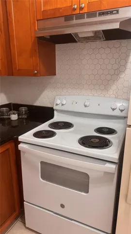 a stove top oven sitting inside of a appliances