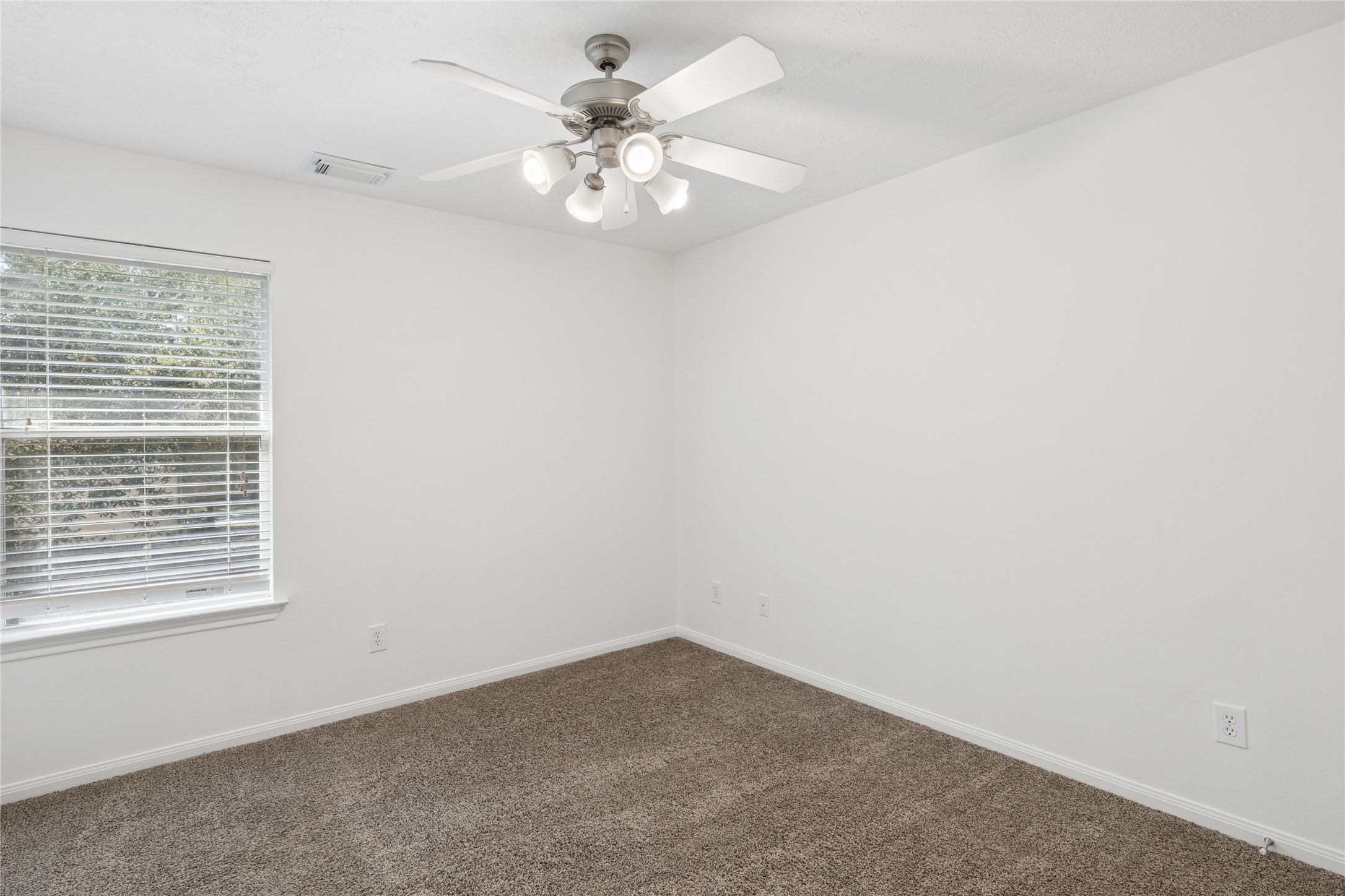 82 West Twinvale Loop Conroe, TX 77384 - Photo 25 of 34 Secondary Bedroom