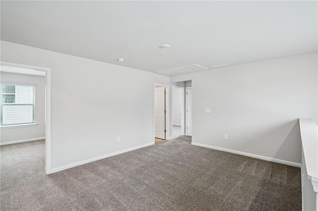 2034 Avalon Ridge Conyers, GA 30013 - Photo 16 of 35 a view of an empty room