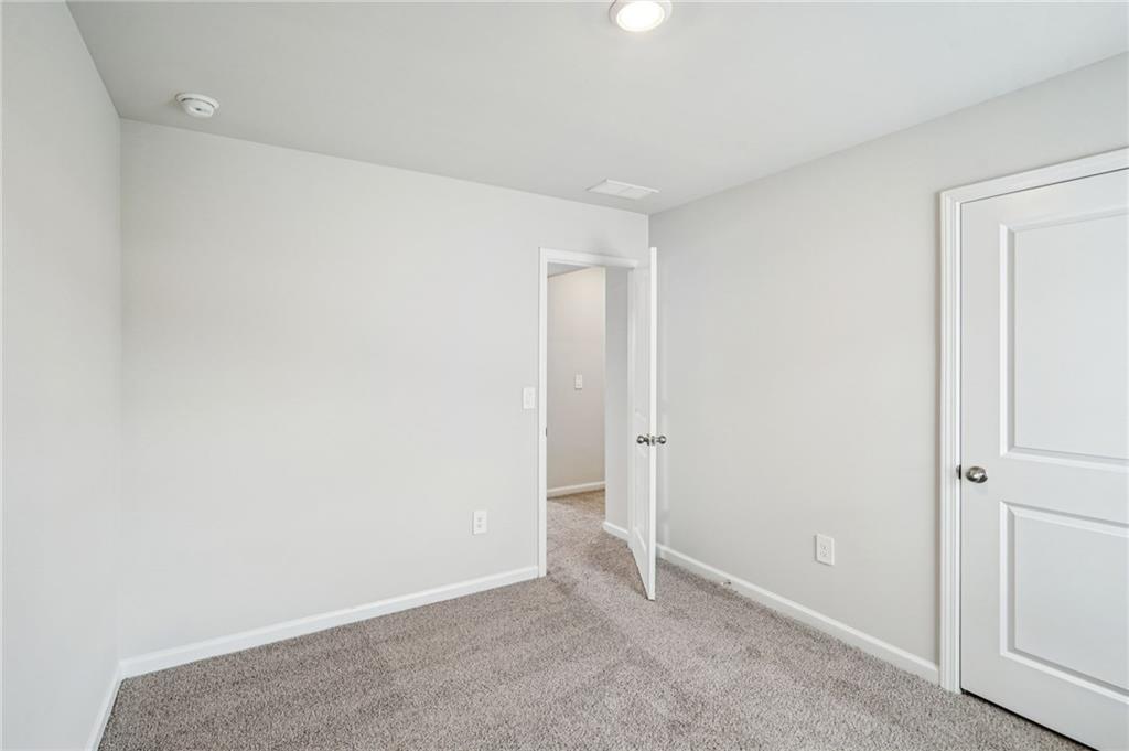 2034 Avalon Ridge Conyers, GA 30013 - Photo 24 of 35 a view of an empty room