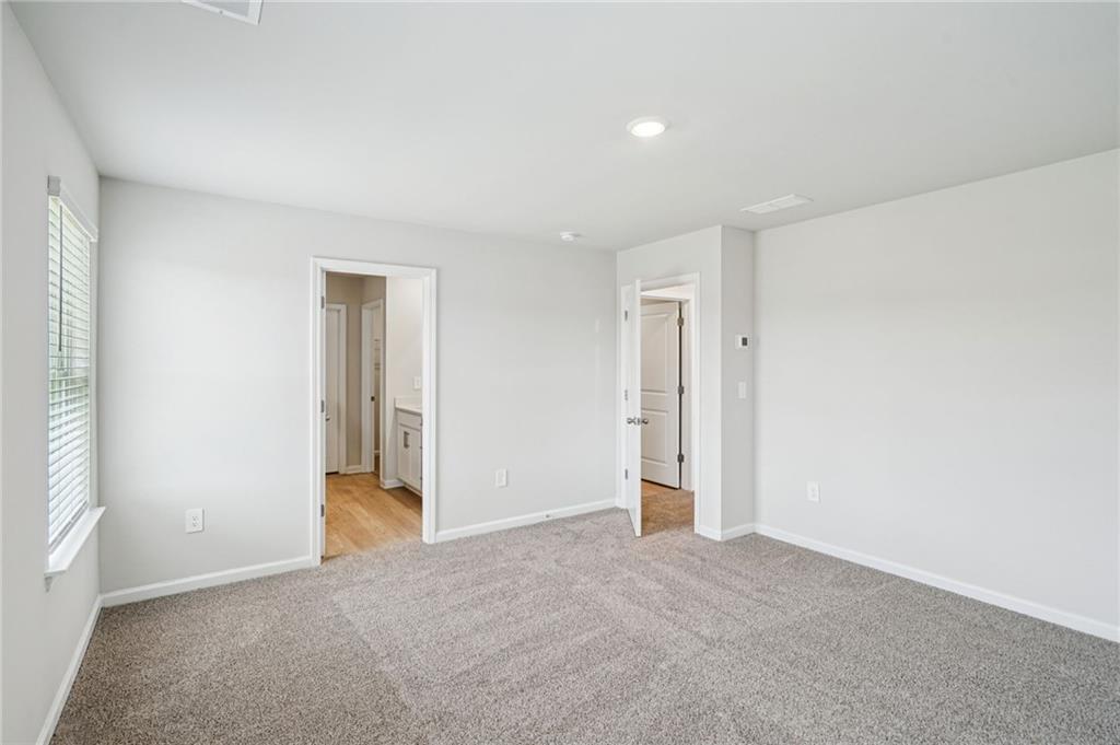 2034 Avalon Ridge Conyers, GA 30013 - Photo 28 of 35 a view of an empty room