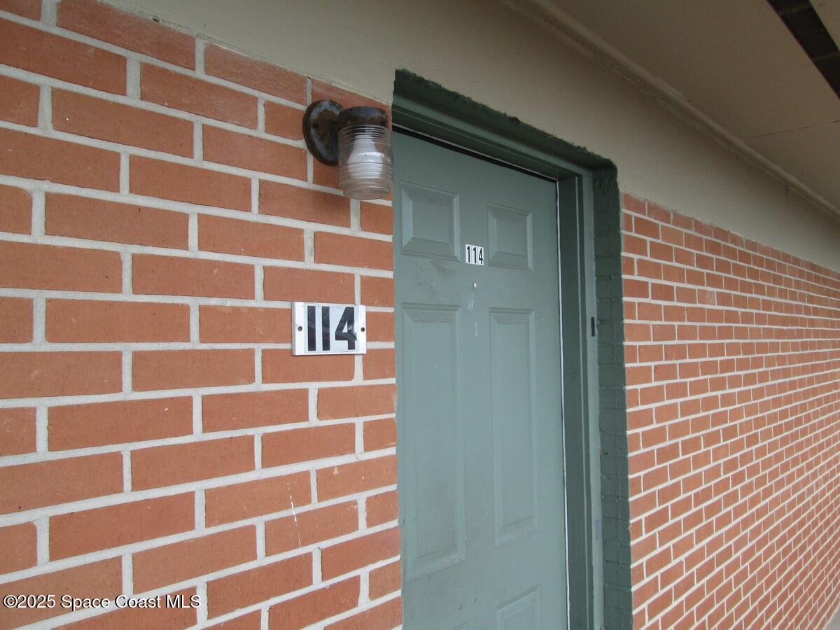 800 North Fiske Boulevard, Unit 114 Cocoa, FL 32922 - Photo 1 of 17 a view of a brick wall