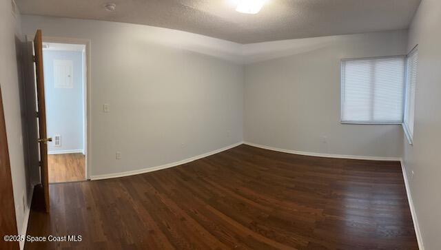 800 North Fiske Boulevard, Unit 114 Cocoa, FL 32922 - Photo 15 of 17 a view of an empty room with wooden floor and a window