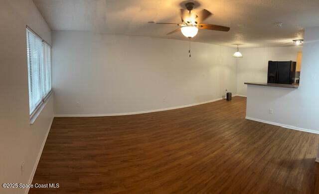 800 North Fiske Boulevard, Unit 114 Cocoa, FL 32922 - Photo 10 of 17 wooden floor in an empty room with a window