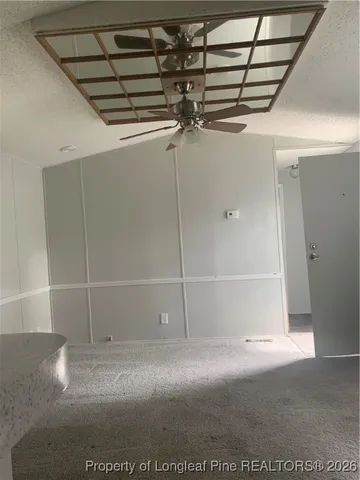 a view of a room with racks on the wall