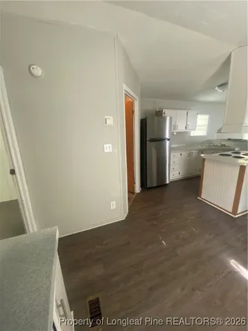 a view of a kitchen with a sink