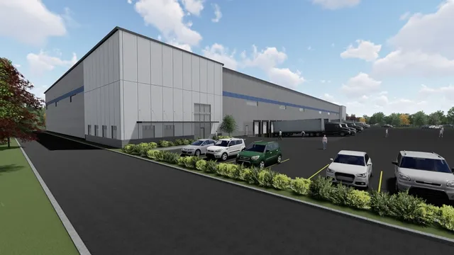 a view of a balcony with chairs and a wooden fence