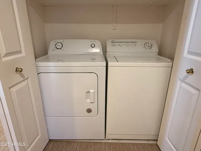 a utility room with dryer and washer