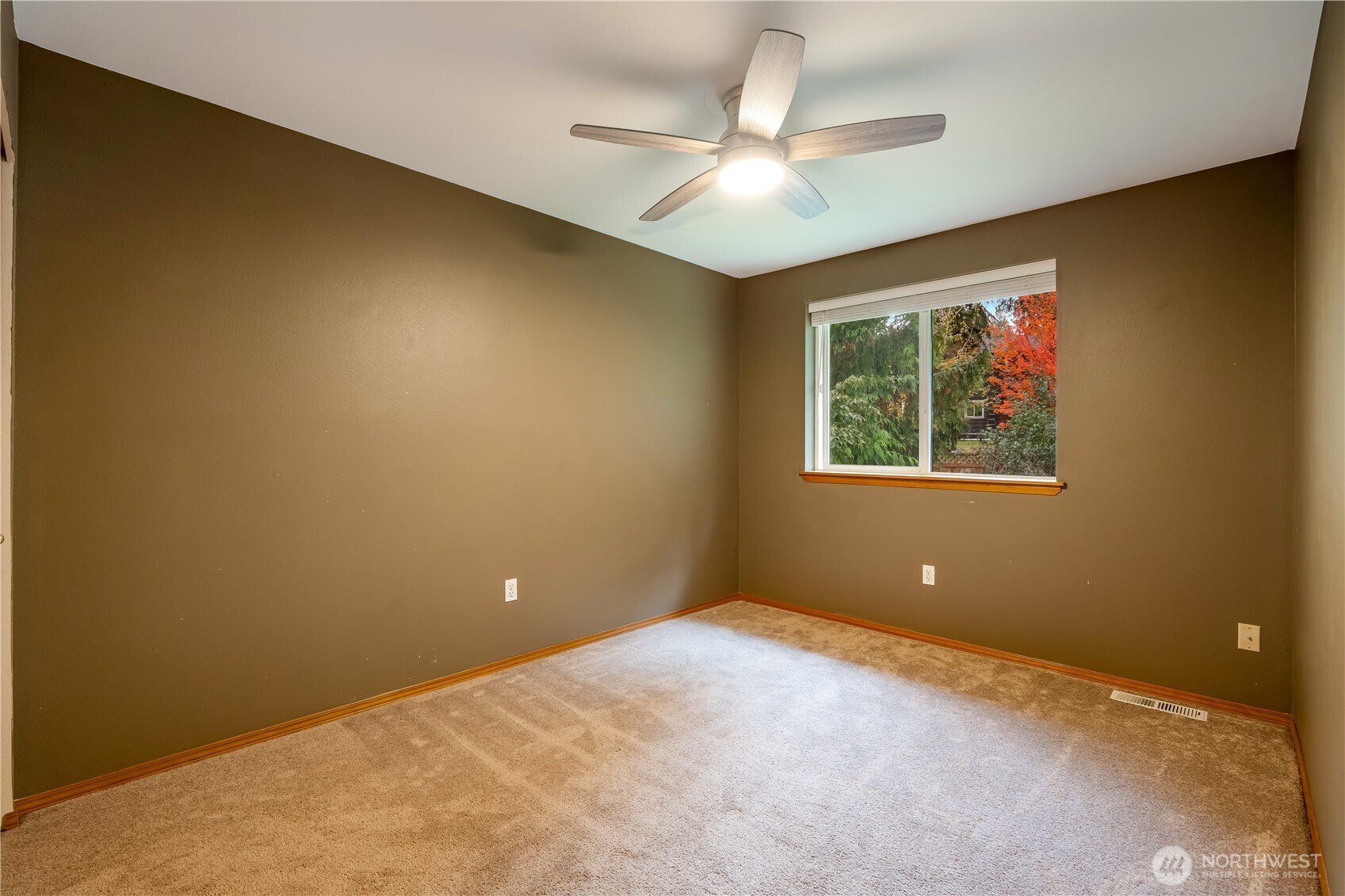 15606 Cascadian Way Bothell, WA 98012 - Photo 20 of 36 a view of an empty room with a window