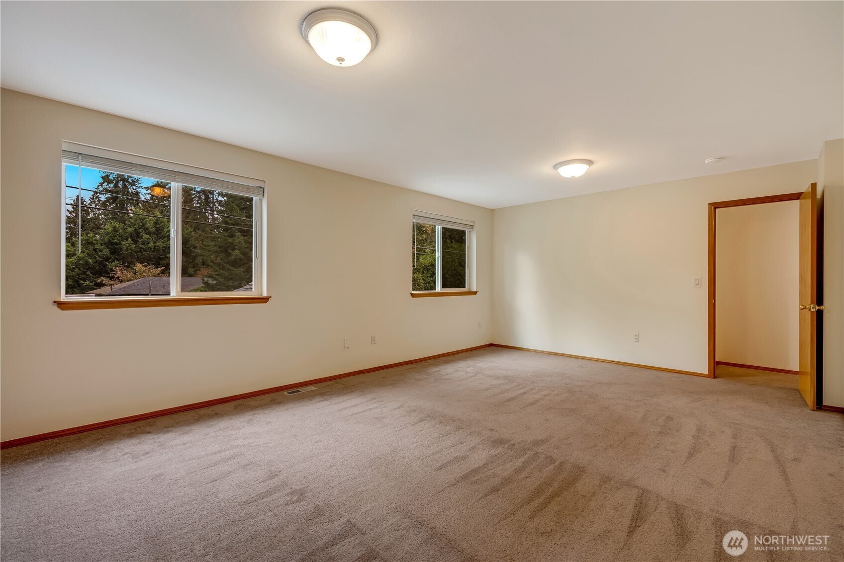15606 Cascadian Way Bothell, WA 98012 - Photo 24 of 36 an empty room with windows