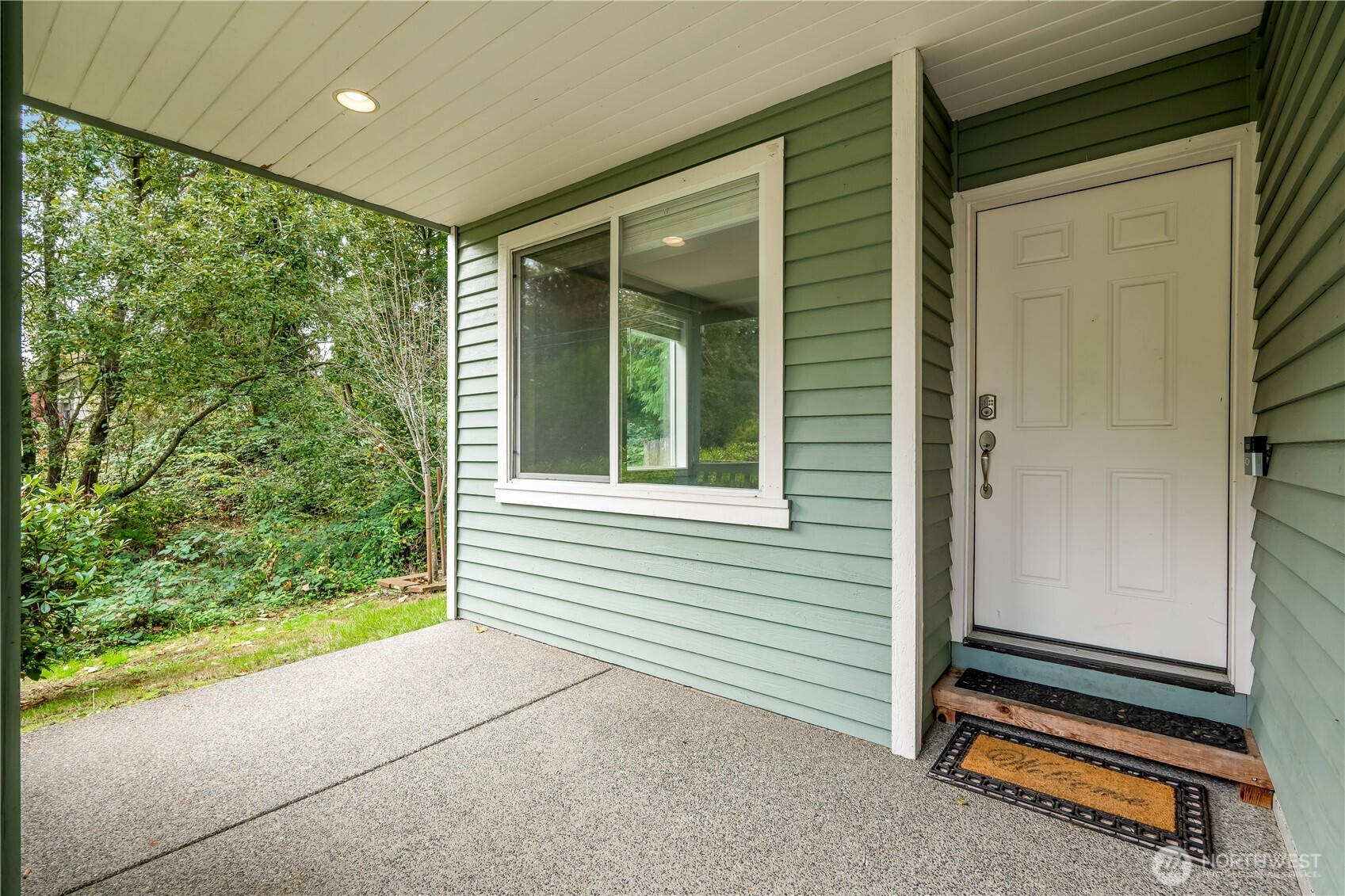 15606 Cascadian Way Bothell, WA 98012 - Photo 3 of 36 a backyard of a house with a garden and barbeque oven