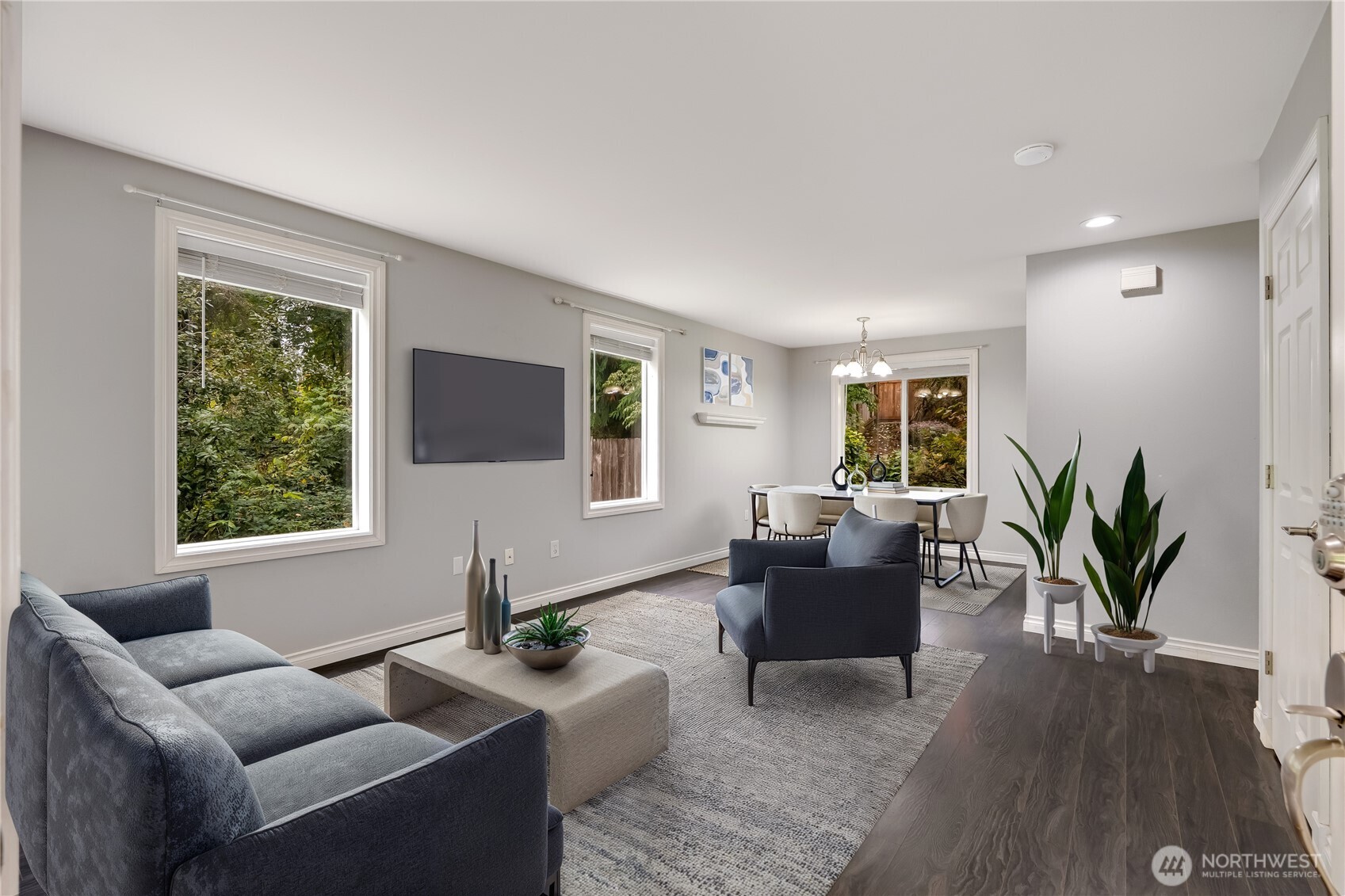 15606 Cascadian Way Bothell, WA 98012 - Photo 4 of 36 a living room with furniture and a potted plant