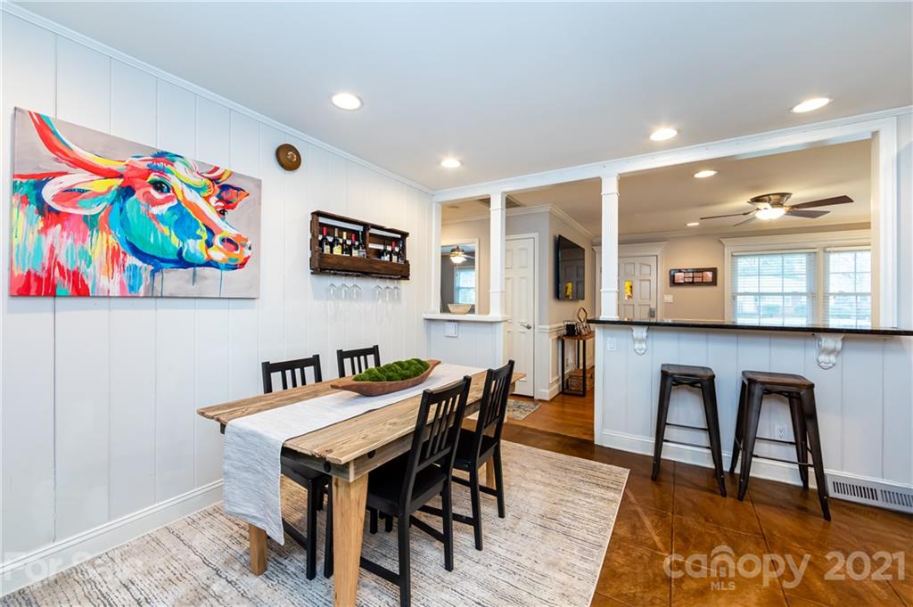 1417 Burnley Road Charlotte, NC 28210 - Photo 15 of 43 a view of a dining room with furniture