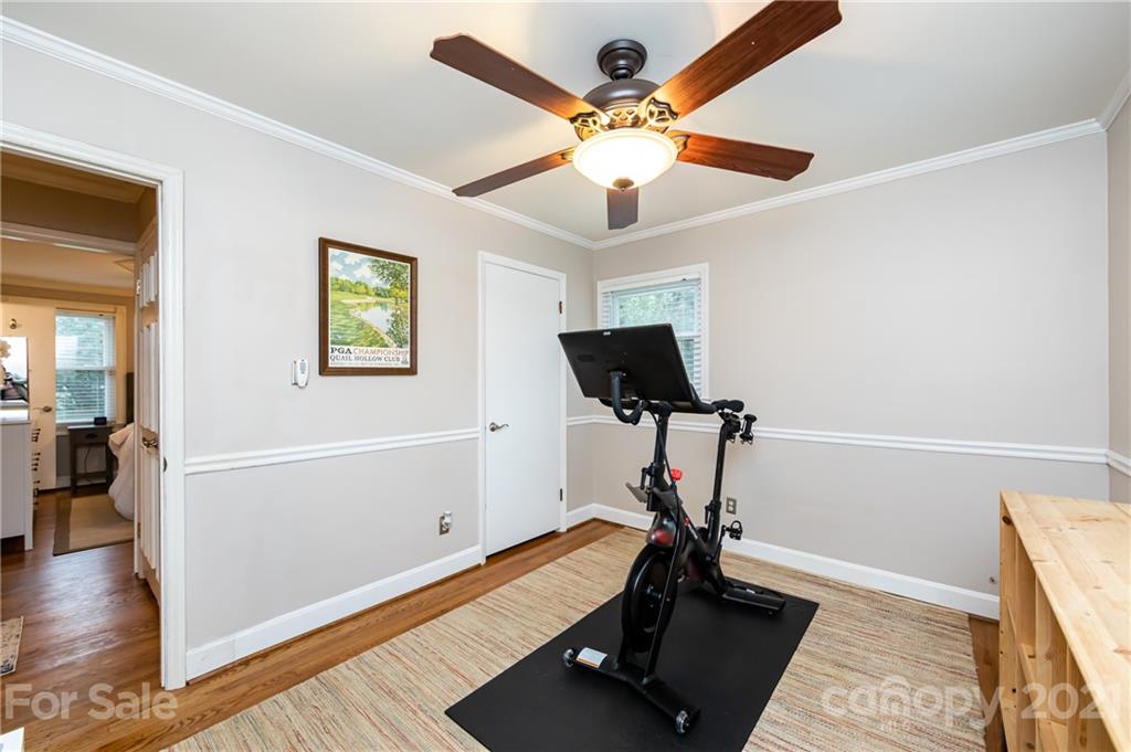 1417 Burnley Road Charlotte, NC 28210 - Photo 30 of 43 a view of a workspace with furniture and a window