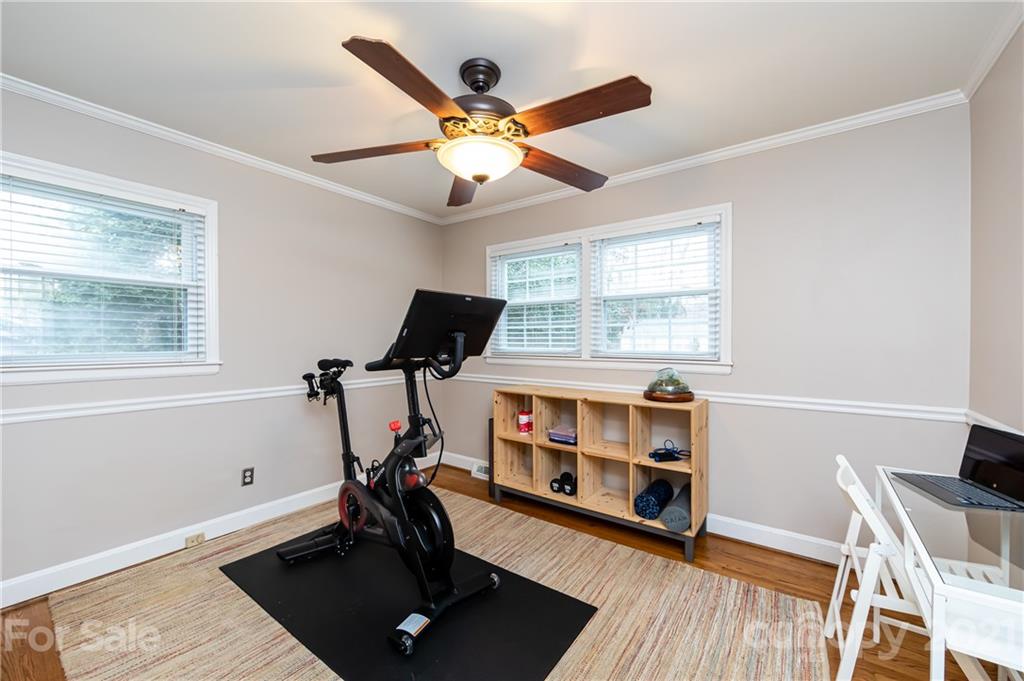 1417 Burnley Road Charlotte, NC 28210 - Photo 31 of 43 a view of a workspace with furniture and a window