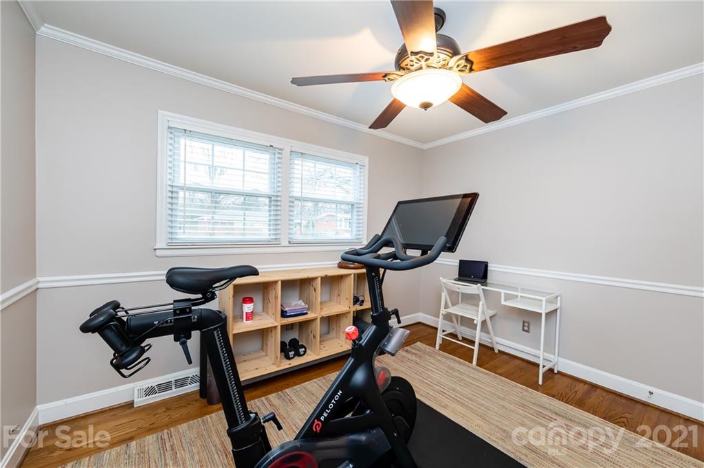 1417 Burnley Road Charlotte, NC 28210 - Photo 32 of 43 a bedroom with furniture and a window