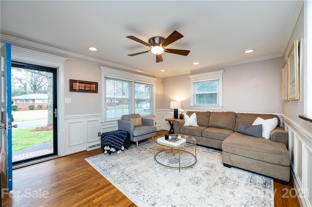1417 Burnley Road Charlotte, NC 28210 - Photo 7 of 43 a living room with furniture and a large window