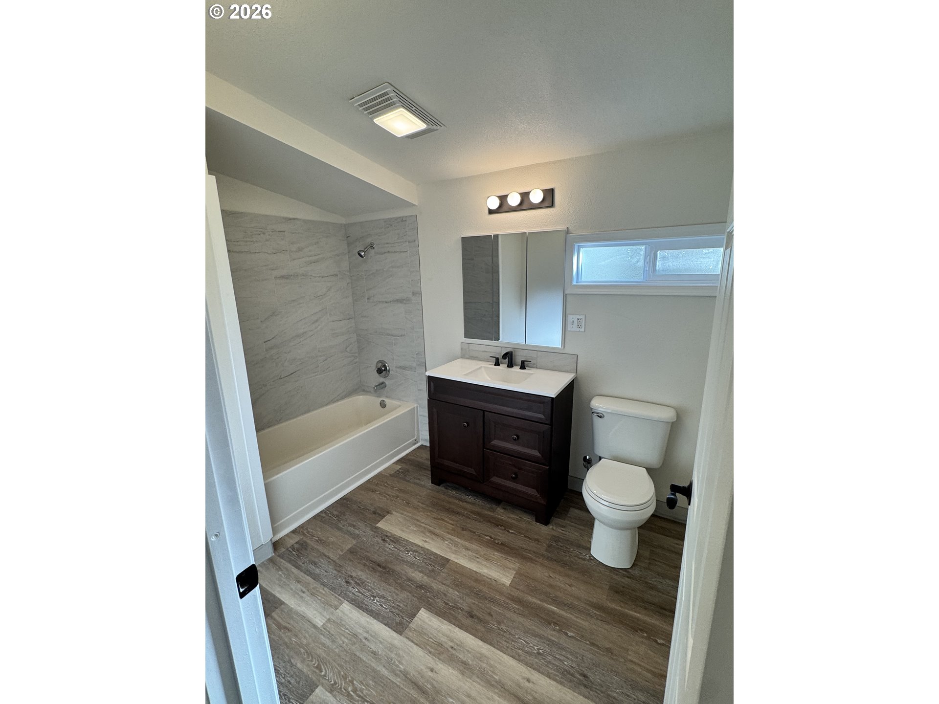 584 North Baxter Street Coquille, OR 97423 - Photo 15 of 39 a bathroom with a sink a toilet and shower