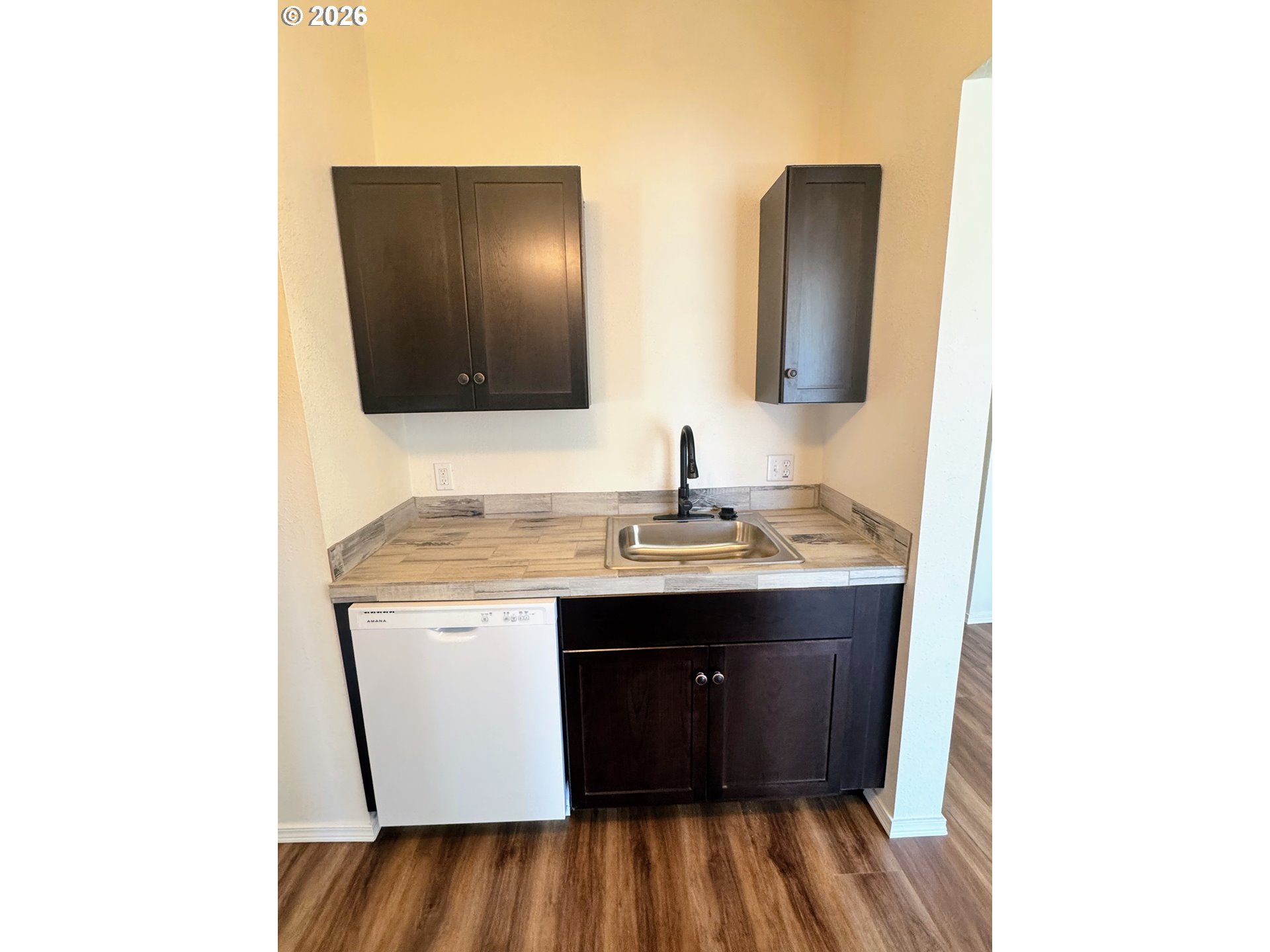 584 North Baxter Street Coquille, OR 97423 - Photo 23 of 39 a bathroom with a sink and a mirror
