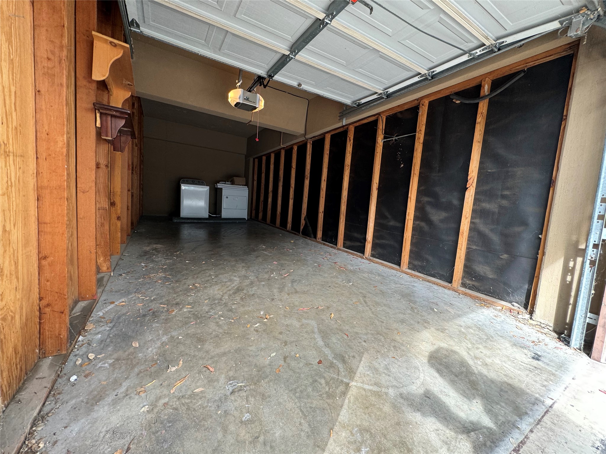 910 Duncan Lane, Unit 43 Austin, TX 78705 - Photo 13 of 15 a view of a room with wooden walls