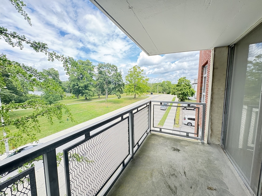 80 Salisbury Street, Unit 308 Worcester, MA 01609 - Photo 16 of 25 a view of balcony with yard