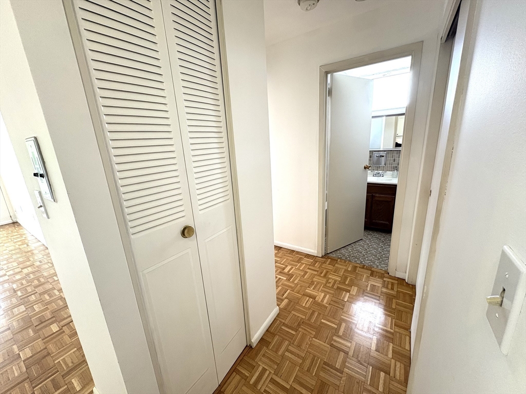 80 Salisbury Street, Unit 308 Worcester, MA 01609 - Photo 5 of 25 a view of a bathroom from a hallway