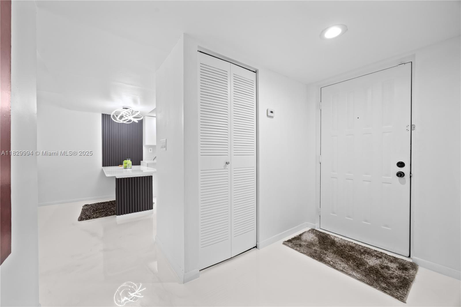 8810 Southwest 132nd Place, Unit 101DN Miami, FL 33186 - Photo 12 of 39 a bathroom with a shower