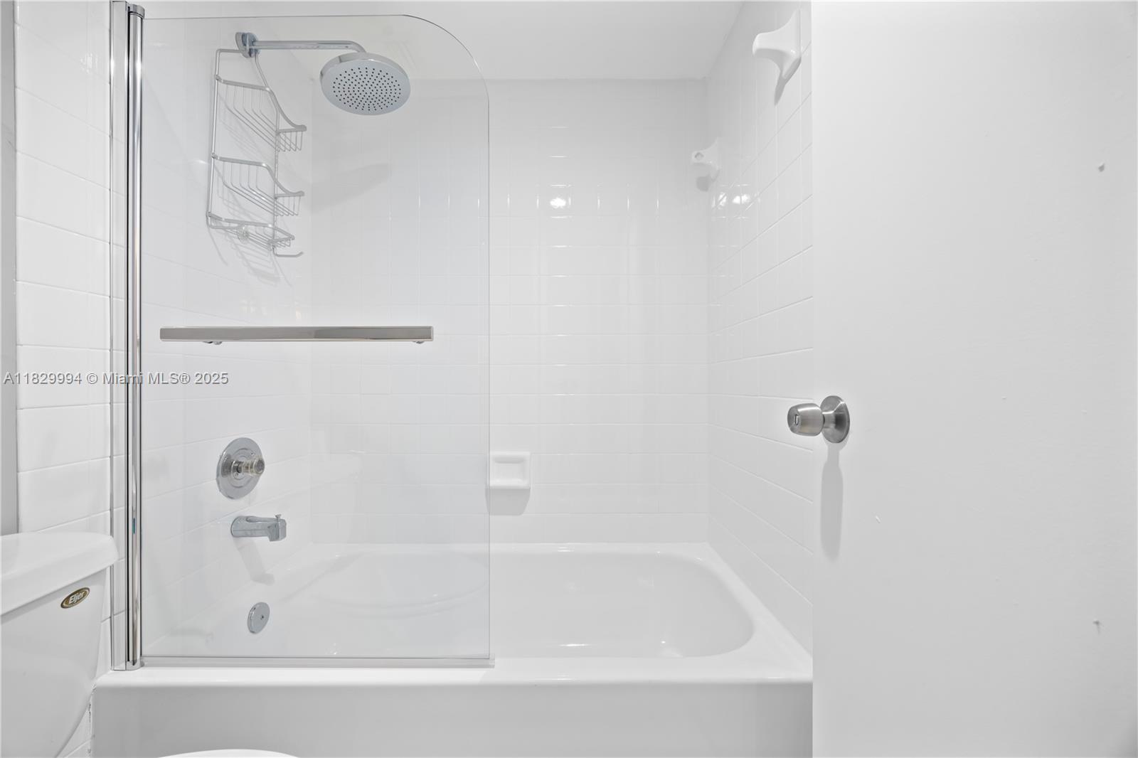 8810 Southwest 132nd Place, Unit 101DN Miami, FL 33186 - Photo 20 of 39 a close view of a bathtub in bathroom